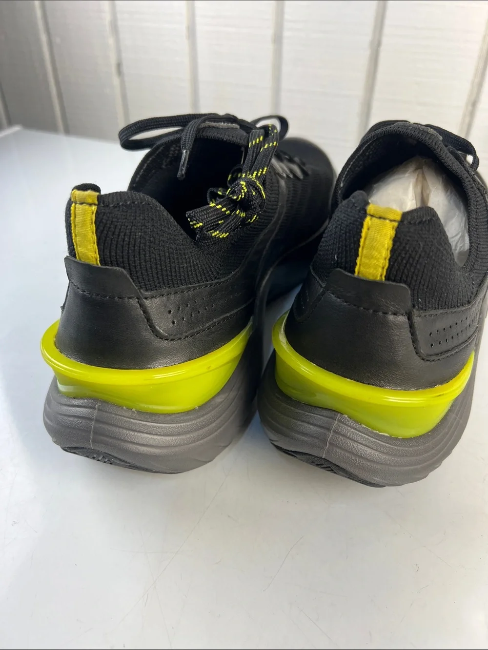 Johnston & Murphy Black Sneakers with Yellow Heel Accent